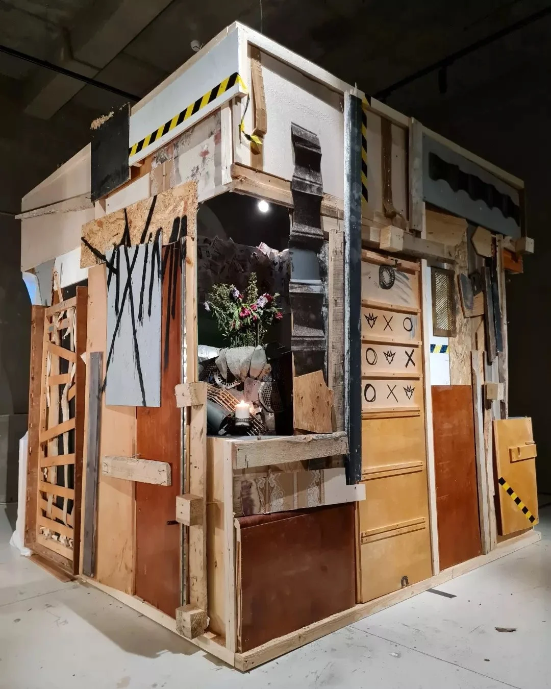 The Cell of Society: a hut built from found street objects